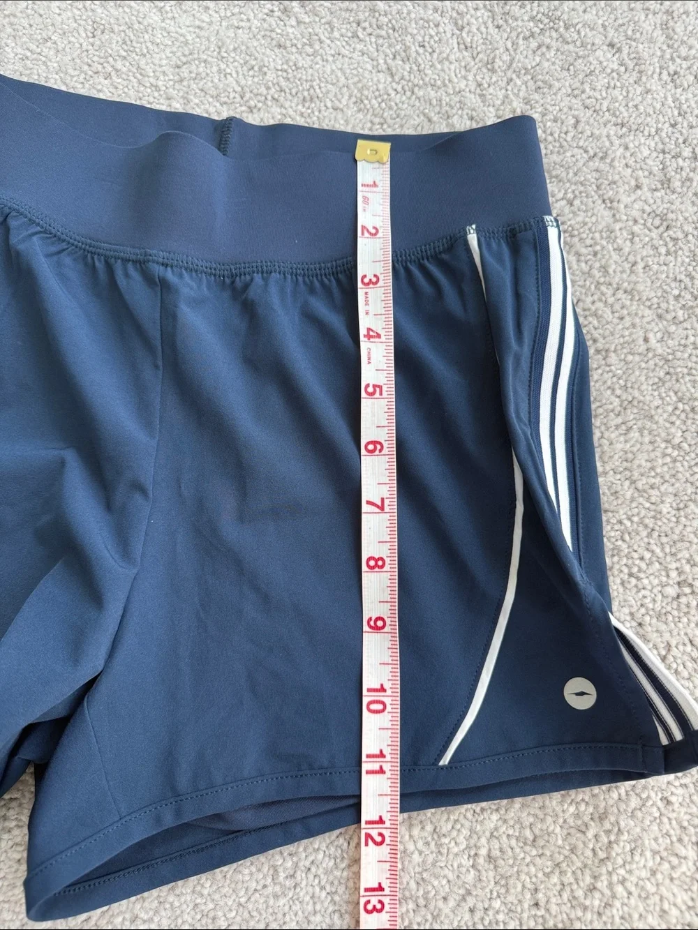 Avia Women's Active Side Stripe Shorts in navy blue with white detailing Size S